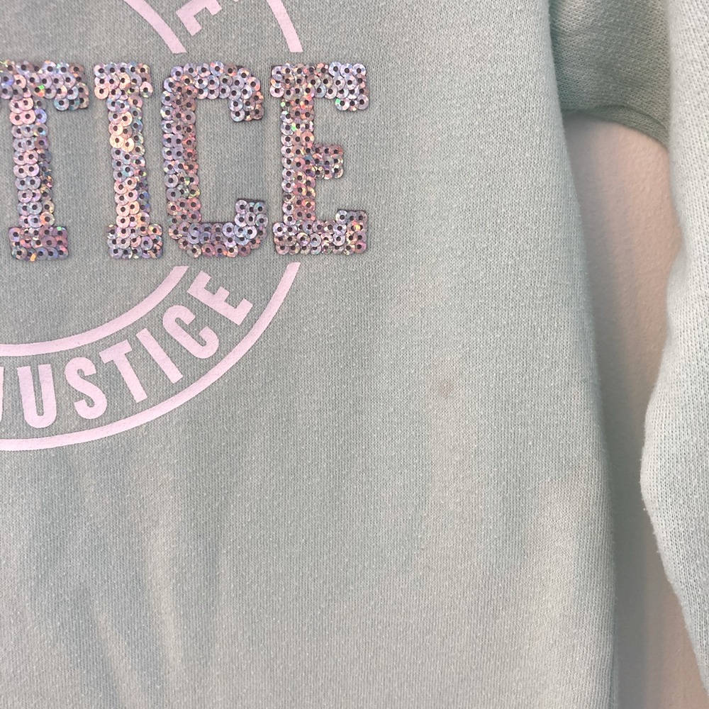 Justice sweater